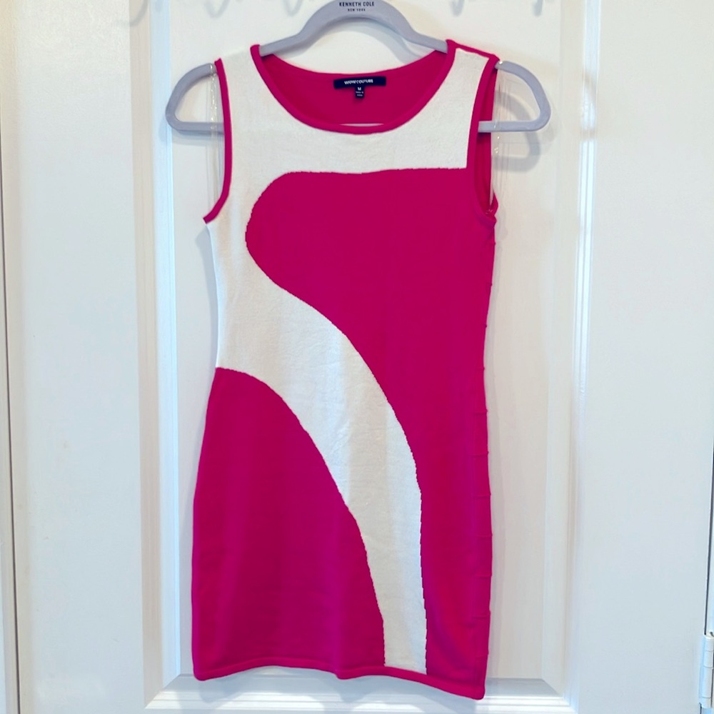 Sleeveless knit tank hot pink and white. Delicately worn no holes or tears.
